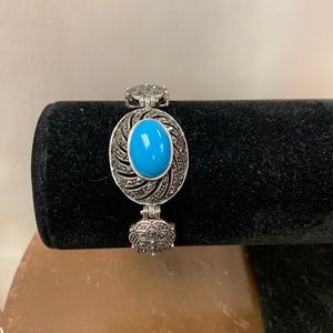 Silver marcasite bracelet Where the faux turquoise stone.